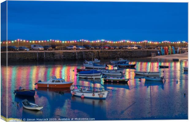 Mousehole Harbour at night Canvas Print by Simon Maycock