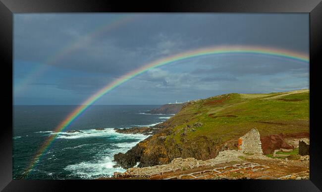 Rainbow over Pendeen lighthouse Framed Print by David Belcher