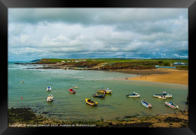 Boats moored off Bude in North Cornwall Framed Print by Michael Shannon