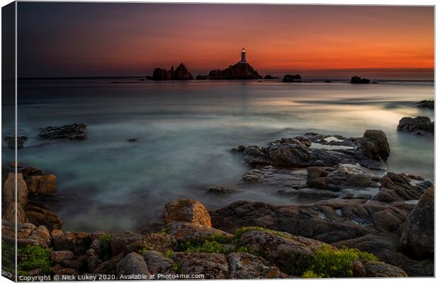 Le Corbiere Lighthouse Island of Jersey Canvas Print by Nick Lukey