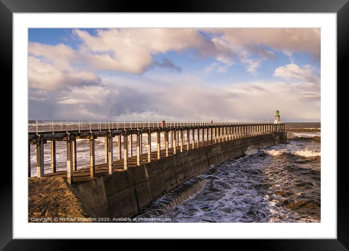 Whitby West Pier on a stormy day Framed Mounted Print by Michael Shannon