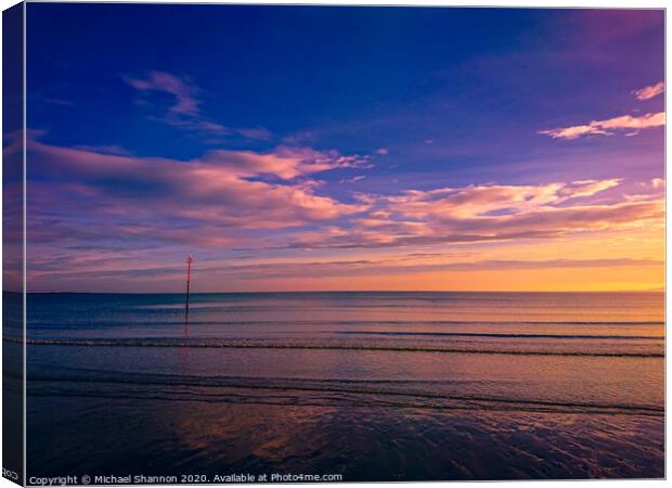 Sunrise at Filey on the North Yorkshire Coast. Canvas Print by Michael Shannon