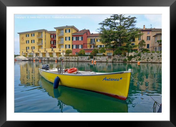  A small boat moored in the harbour of Sirmione, Lake Garda, Italy Framed Mounted Print by Navin Mistry