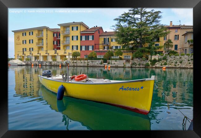  A small boat moored in the harbour of Sirmione, Lake Garda, Italy Framed Print by Navin Mistry