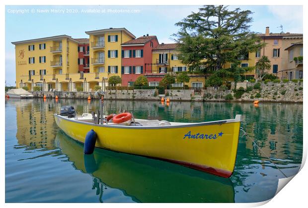  A small boat moored in the harbour of Sirmione, Lake Garda, Italy Print by Navin Mistry