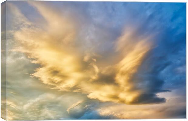 Nice cloudscape with sunset light Canvas Print by Arpad Radoczy