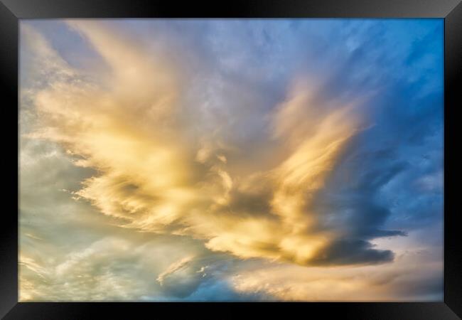 Nice cloudscape with sunset light Framed Print by Arpad Radoczy
