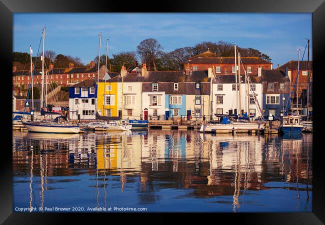 The beautiful Weymouth Harbour on a still April evening Framed Print by Paul Brewer
