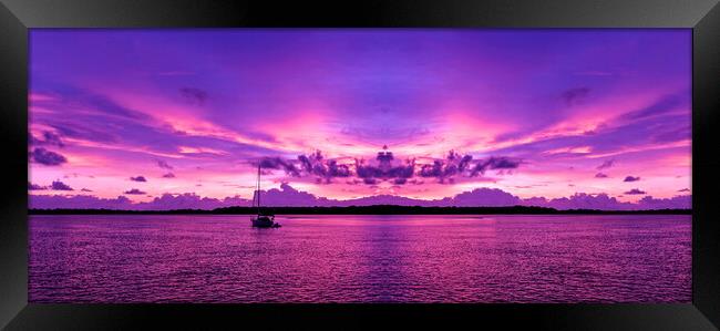  Coastal sunrise seascape in a purple sky.  Framed Print by Geoff Childs