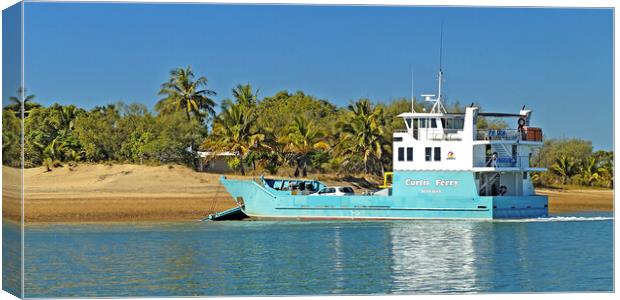 Transporter Ferry delivering goods to a tropical i Canvas Print by Geoff Childs