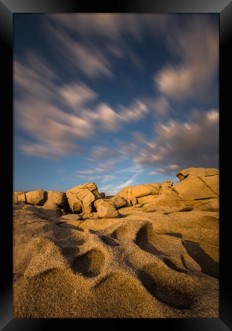 Long exposure clouds over the interesting shape rock Framed Print by Arpad Radoczy