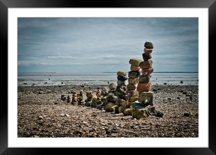 'Land art' on East Beach, Shoeburyness, Essex, UK. made from found stones, and rocks. Remains of historic victorian military buildings on the shoreline. Framed Mounted Print by Peter Bolton