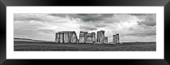 Panoramic view of Stonehenge ancient monument in black and white. Wiltshire, UK Framed Mounted Print by Peter Bolton