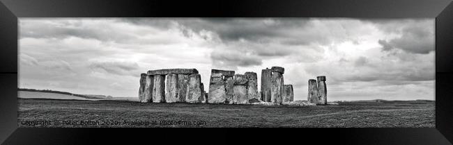 Panoramic view of Stonehenge ancient monument in black and white. Wiltshire, UK Framed Print by Peter Bolton