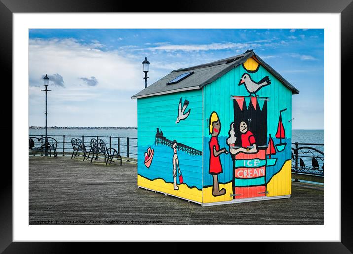 A beach hut display on the pier at Southend on Sea, Essex, Uk. Framed Mounted Print by Peter Bolton