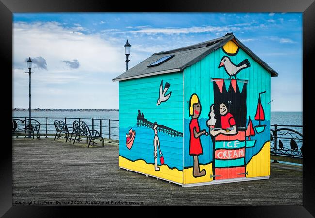 A beach hut display on the pier at Southend on Sea, Essex, Uk. Framed Print by Peter Bolton