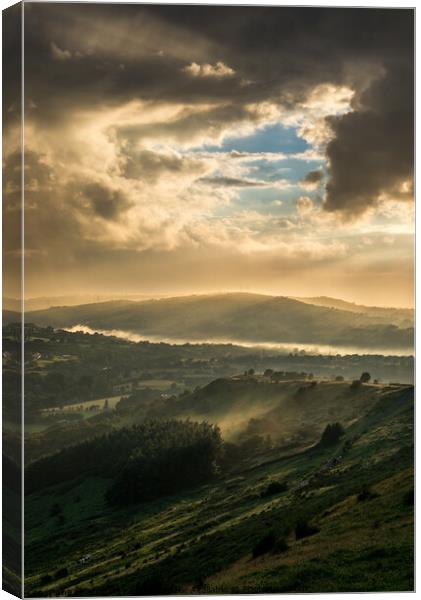 Mist and sunbeams over Charlesworth, Derbyshire Canvas Print by Andrew Kearton