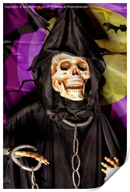 Halloween, death doll in a black hoodie with metal chains and shackles on his hands. Print by Sergii Petruk