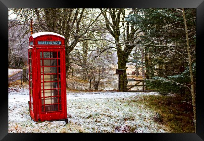 Old Red Phone Box in the Snow Framed Print by Derek Beattie