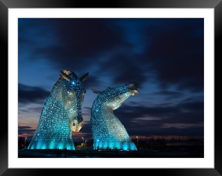 The Kelpies, Illuminated in blue at night. Framed Mounted Print by Tommy Dickson