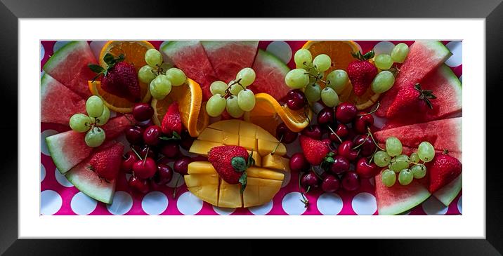 A colourful Christmas breakfast fruit platter on a dining table closeup. Framed Mounted Print by Geoff Childs