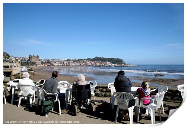 Tourists enjoying the view of Scarborough over the bay at low tide Print by john hill