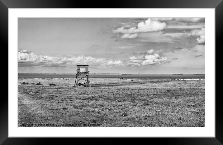 Black and white landscape of coastal nature reserve with an observation hide. At Bradwell, Essex. Framed Mounted Print by Peter Bolton