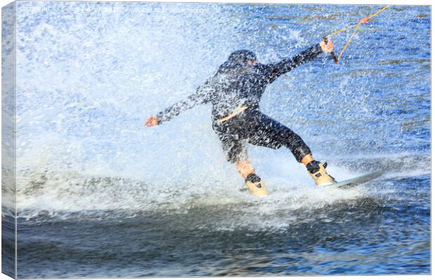 Wakeboarder rushing through the water at high speed Canvas Print by Sergii Petruk