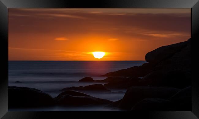 Sunrise in a bay in Costa Brava Framed Print by Arpad Radoczy