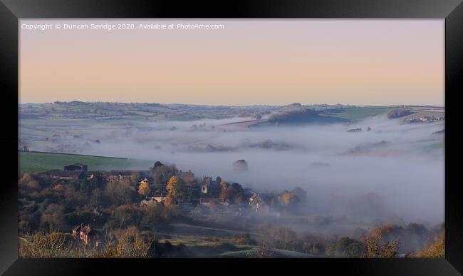Autumnal mist of Englishcombe Village near Bath Framed Print by Duncan Savidge