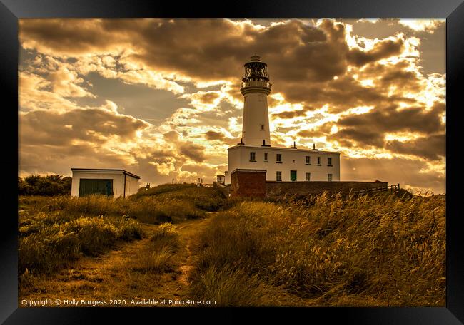 Flamborough light house at sunset  Framed Print by Holly Burgess