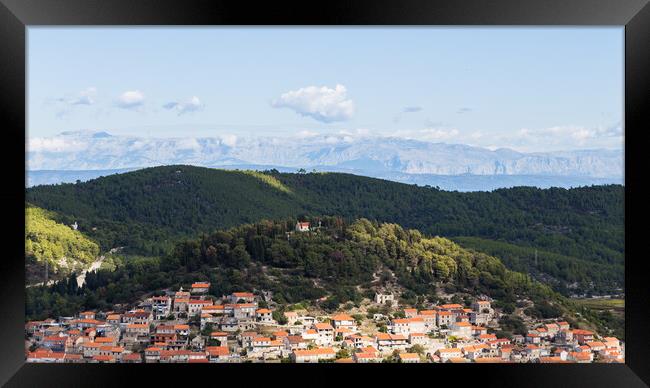 Tiny chuch above the village of Blato Framed Print by Jason Wells