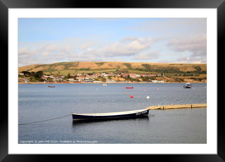 Swanage town from across the bay at Swanage in Dorset. Framed Mounted Print by john hill