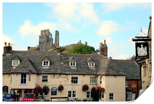 Corfe Castle from the town square in Dorset. Print by john hill
