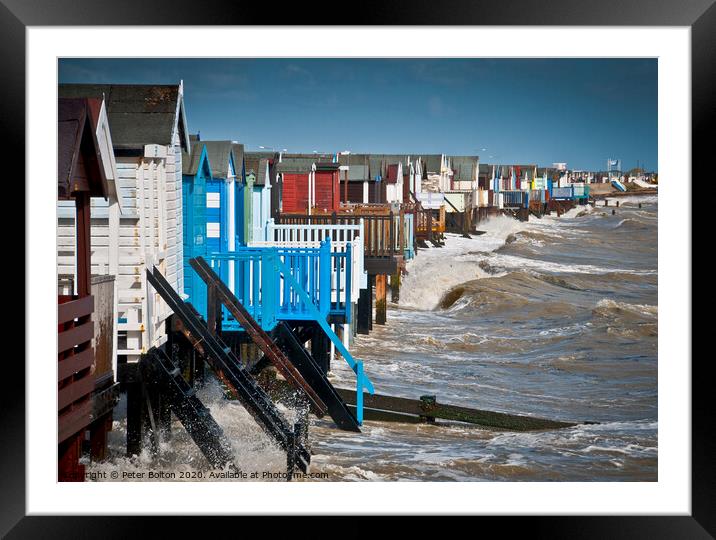 High tide at Thorpe Bay with beach huts. Framed Mounted Print by Peter Bolton