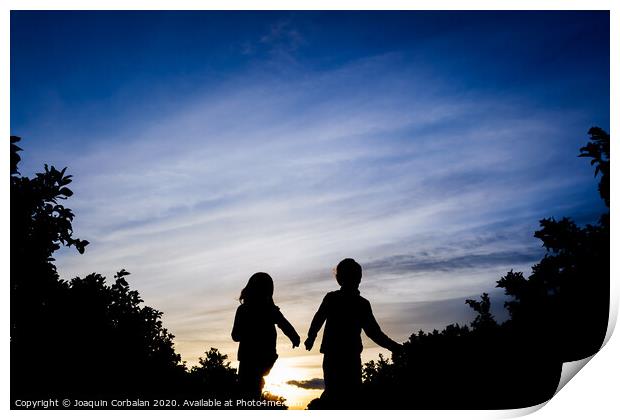 Silhouette of two children running through the field on a winter sunset. Print by Joaquin Corbalan
