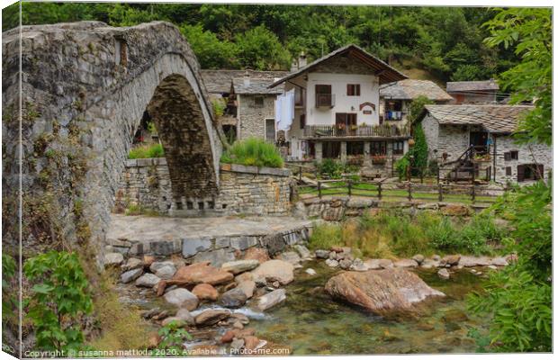 a romanesque bridge made of donkey back of the cen Canvas Print by susanna mattioda