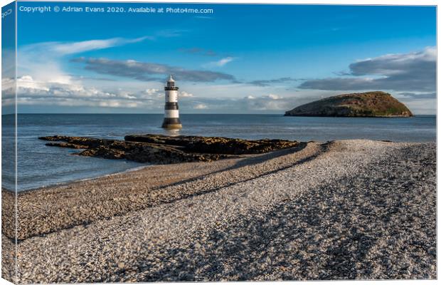 Penmon Point Lighthouse Anglesey Canvas Print by Adrian Evans