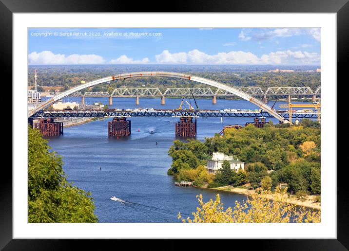 Construction of the Podolsky bridge across the Dnipro in Kyiv, image taken from a height. Framed Mounted Print by Sergii Petruk
