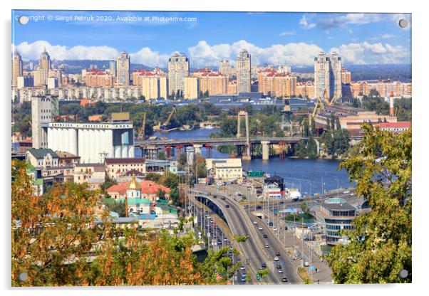 The landscape of the autumn city of Kyiv with a view of the Dnipro River, many bridges, the old Podilsky district and new houses on Obolon. Acrylic by Sergii Petruk