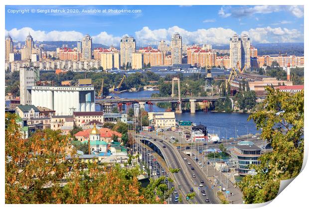 The landscape of the autumn city of Kyiv with a view of the Dnipro River, many bridges, the old Podilsky district and new houses on Obolon. Print by Sergii Petruk