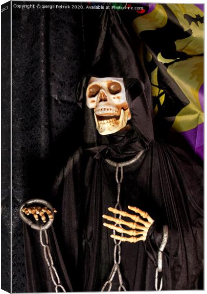 Halloween, death doll in a black hoodie with metal chains and shackles on his hands. Canvas Print by Sergii Petruk
