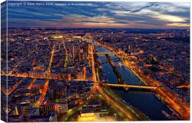 Paris Skyline seen at dusk (from the Eiffel Tower) Canvas Print by Navin Mistry