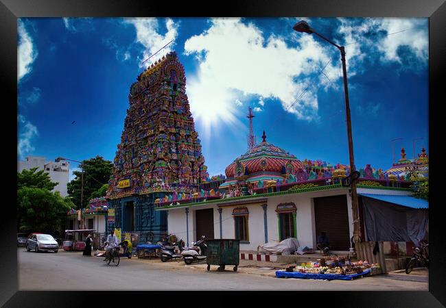 Pondicherry, India -: Wide angle shot of An Indian colorful temple named Vedapureeswarar exterior displaying beautiful hindu architecture with gods sculpture carved on it's built. Framed Print by Arpan Bhatia