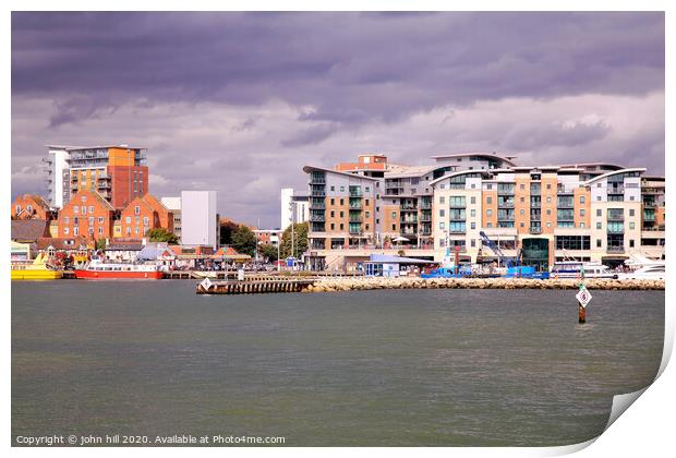 The quayside taken from a ferry at Poole harbour in Dorset Print by john hill