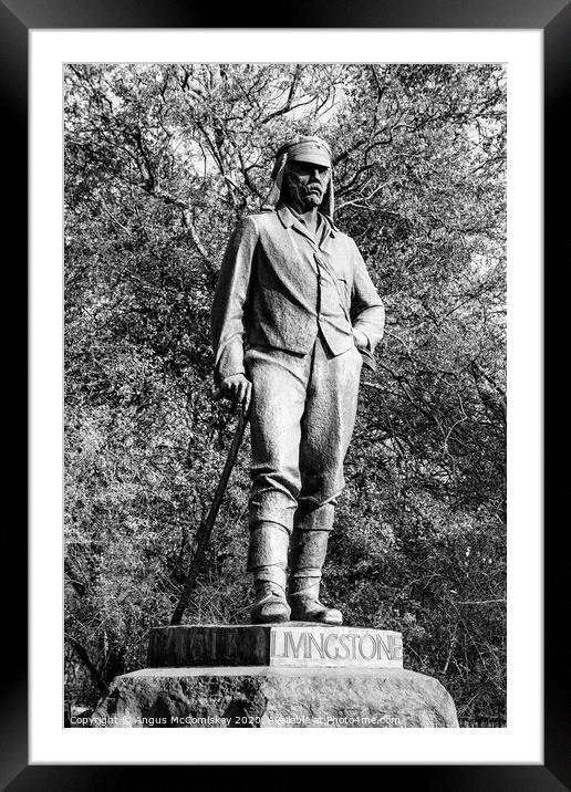 Statue of David Livingstone at Victoria Falls mono Framed Mounted Print by Angus McComiskey