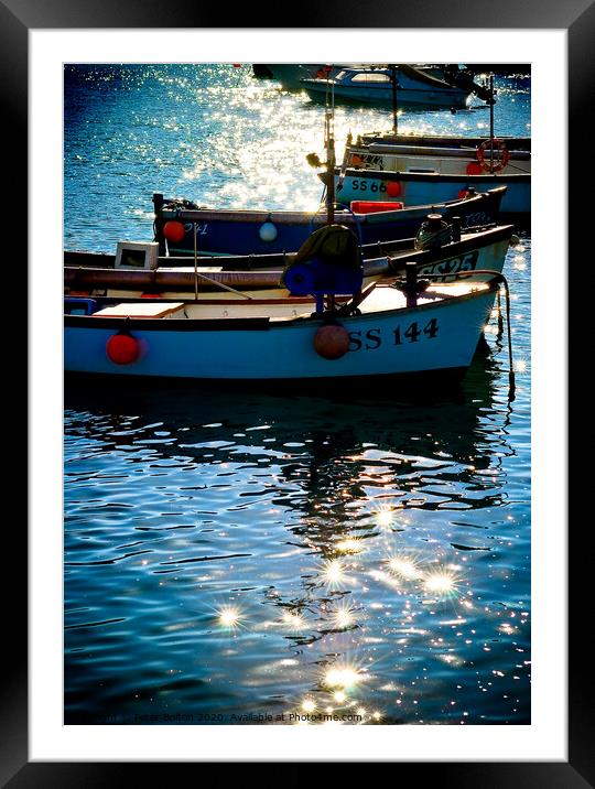 Small boats at anchor in St. Ives harbour with sun light and shadows. Cornwall. Framed Mounted Print by Peter Bolton