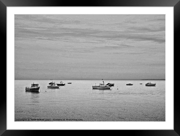 Black and white study of small boats at anchor offshore at Thorpe Bay, Essex. Framed Mounted Print by Peter Bolton