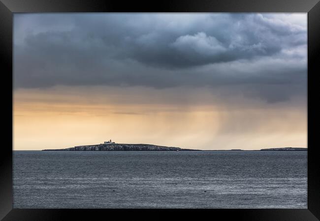 Longstone lighthouse in a squall Framed Print by Gary Finnigan