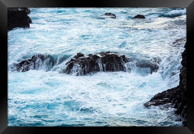 Wild seas rushing over rocks, Tenerife Framed Print by Phil Crean